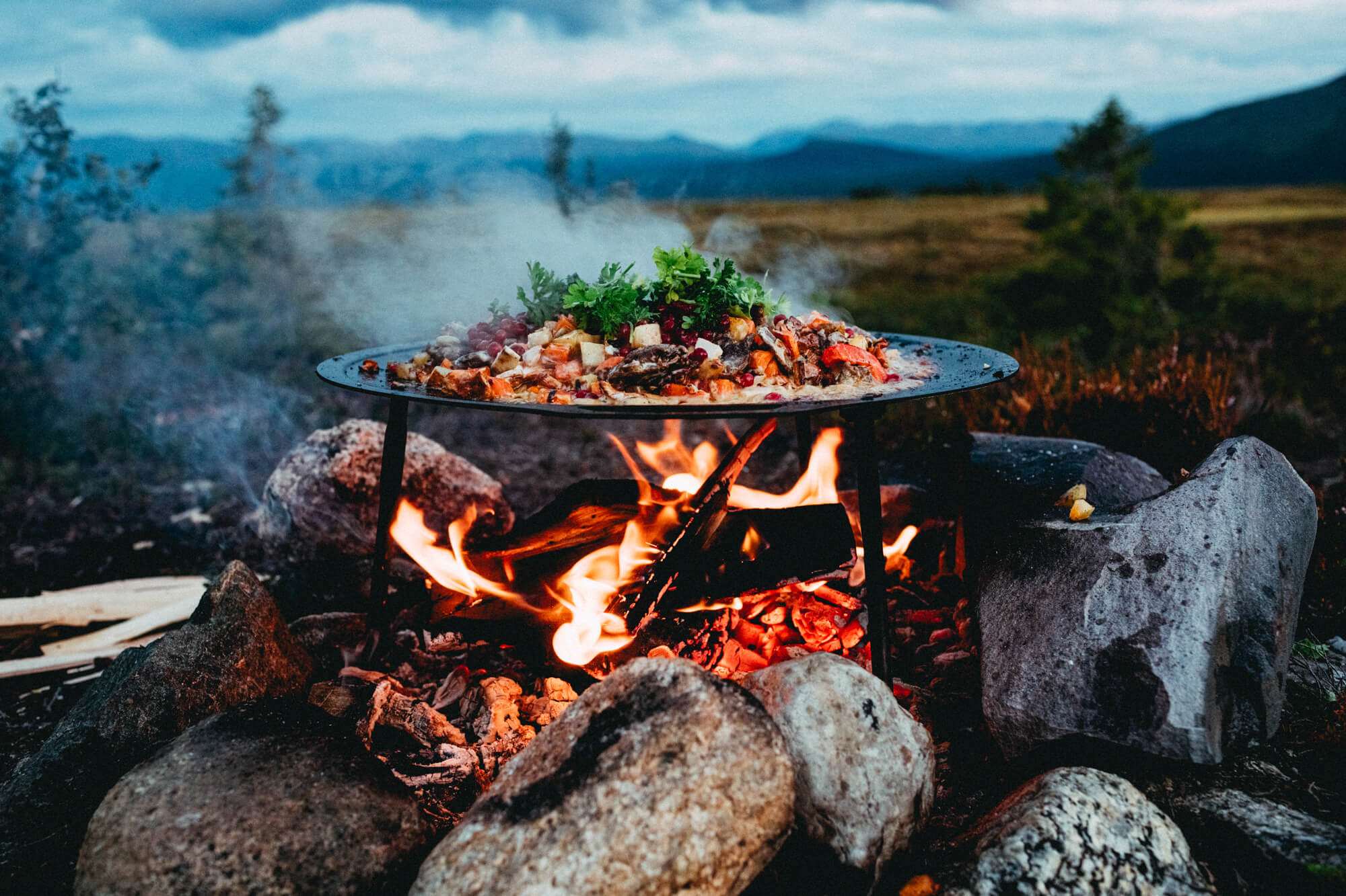 Renskavspanna över öppen eld